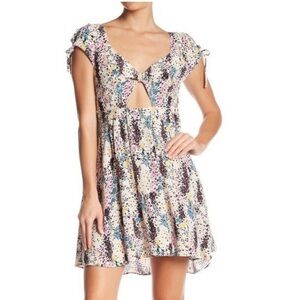 Free People Miss Right cream purple yellow front cutout floral dress size Small